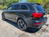 an image of a black audi suv parked in a parking lot