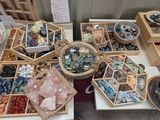 many different kinds of rocks and stones on the table