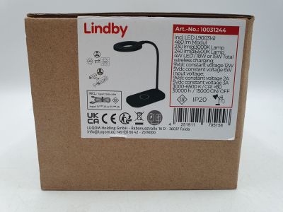 une image représentant une boîte sur laquelle est posée une lampe noire