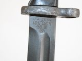 a close up of a knife with a metal handle