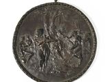 une plaque en bronze représentant une femme et un homme