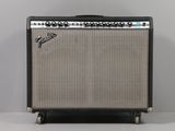 an image of a guitar amplifier sitting on top of a table