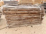a pile of wood that is sitting on the ground