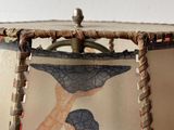 a lamp shade with a picture of a woman on it