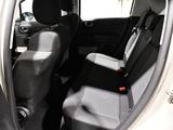 two seats in the back of a white car