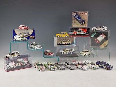a lot of toy cars on display in a display case