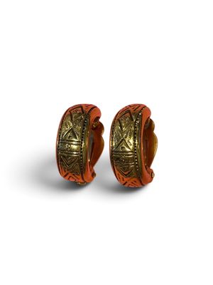 an image of a pair of orange and gold hoop earrings