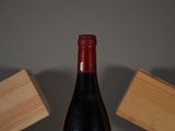 a bottle of wine that is sitting on a table