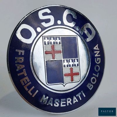 an image of a badge for a car that is on display