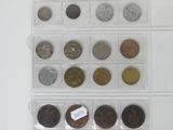 a lot of coins that are in a clear box