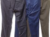 three pairs of men ' s pants hanging on a clothes rack