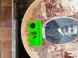 a plate with a picture of a man on it