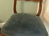 a chair that is sitting in the corner of a room