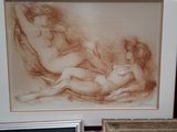 a picture of a drawing of a nude woman and a picture of a naked woman