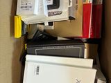 a box full of electronic equipment sitting on top of a table