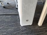 an image of a white computer tower in an office