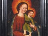 an old painting of a woman holding a child in her arms