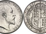 Gros plan sur une pièce de monnaie portant le visage d'un homme