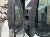 an image of a side view mirror of a truck