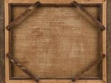 a close up of a wooden frame on a white background