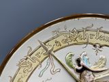 a close up of a clock with a clock face on it