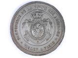 an image of a silver coin with a coat of arms on it