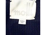 the label of a sweater that says molli
