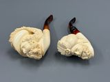 paire de figurines en ivoire sculpté représentant un homme et une femme