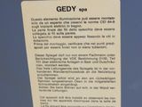 a sign on the side of a blue refrigerator