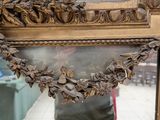 a mirror that has a bunch of flowers on it