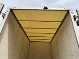 a picture of the inside of a truck with the door open