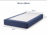 les dimensions d'un cadre de lit avec un matelas posé dessus