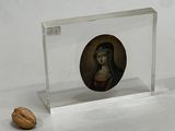 a picture of a picture of a woman and a walnut