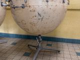two drums that are sitting on the floor
