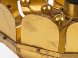 brass plated candle holder with brass balls and a candle holder