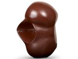 a chocolate sculpture of a man ' s head on a white background