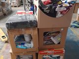 a pile of boxes sitting on top of a pallet in a warehouse