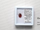 a picture of a red stone in a white box