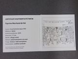a card with a drawing of a group of people on it