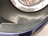 a close up of a car ' s headlight on the front of the car