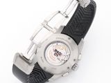 an image of a close up of a wrist watch on a white surface