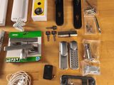 the contents of a cell phone are laid out on the table