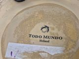 a toilet that has a sign on it that says todo mundo holland