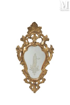 a gold frame with a picture of a woman on it