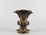 an image of a brass vase on a white background
