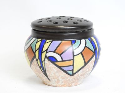 a colorful vase with a black lid on a white background