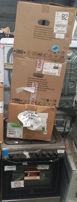 many boxes stacked on top of each other in a store