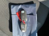 a pair of glasses sitting on the seat of a car