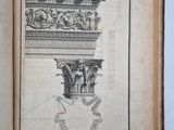 an old book with a drawing of a column on it