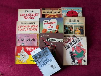 un grand nombre de livres posés sur une table